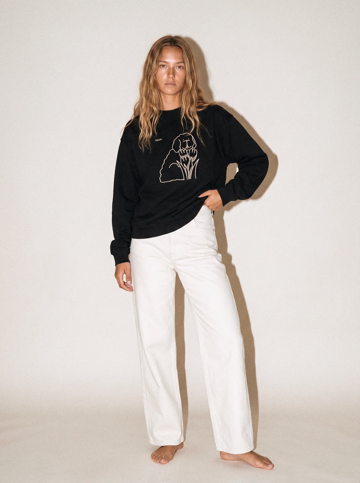 artist collection bloom tulip dog design black crewneck sweatshirt female model editorial