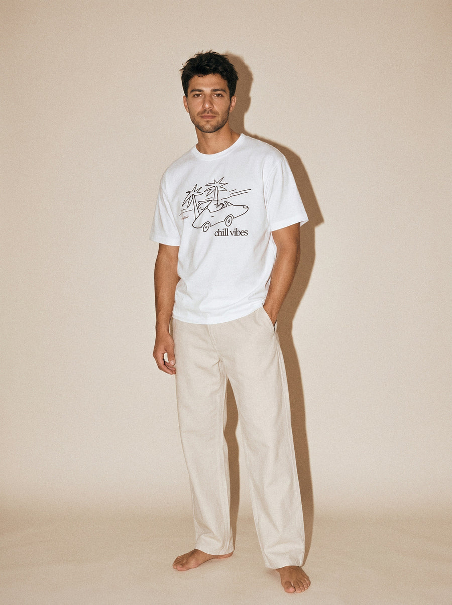 artist collection chill vibes palms dog design pure white t shirt male model editorial full body
