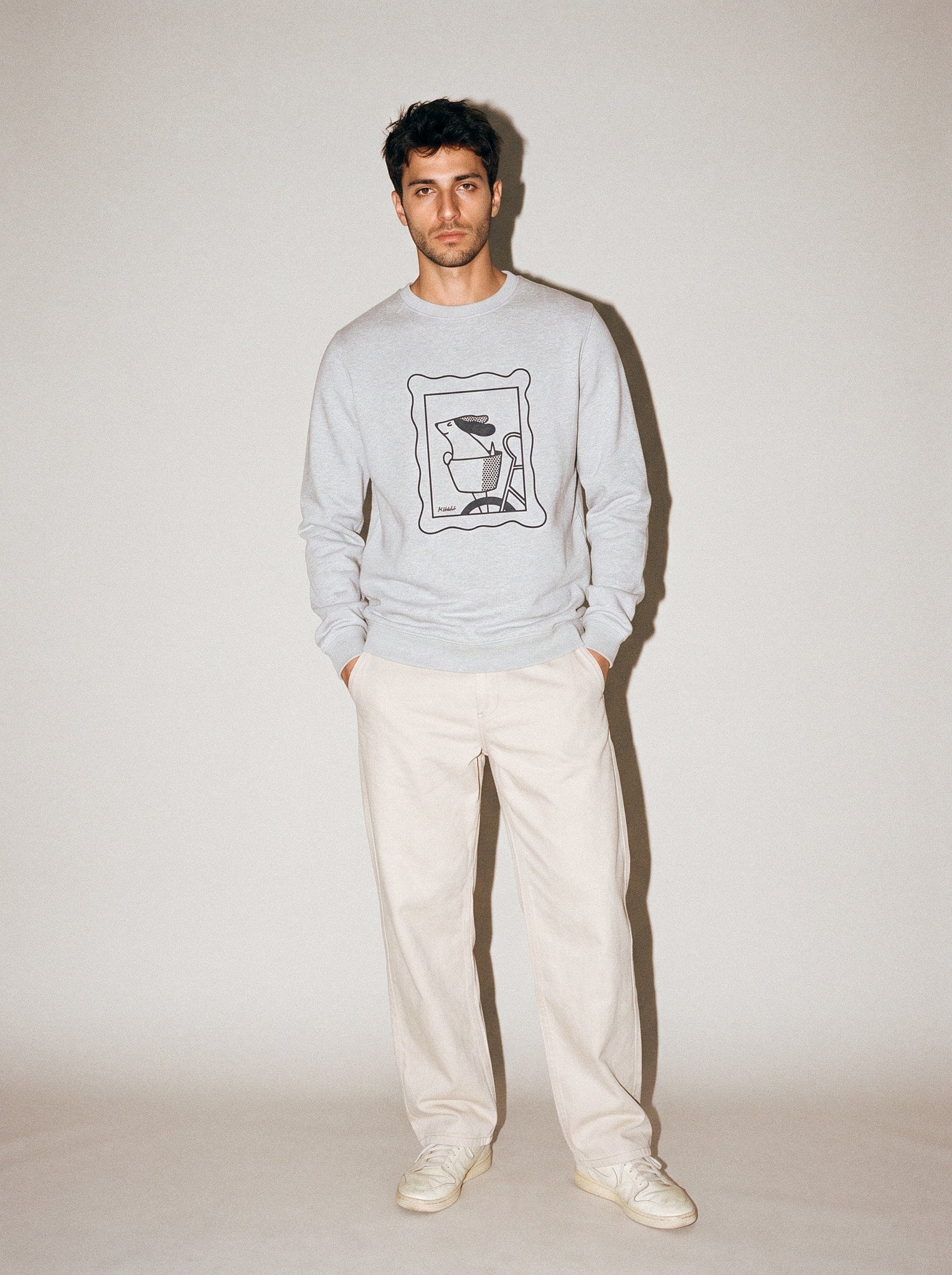 artist collection sunday ride basket dog design heather grey crewneck sweatshirt male model editorial