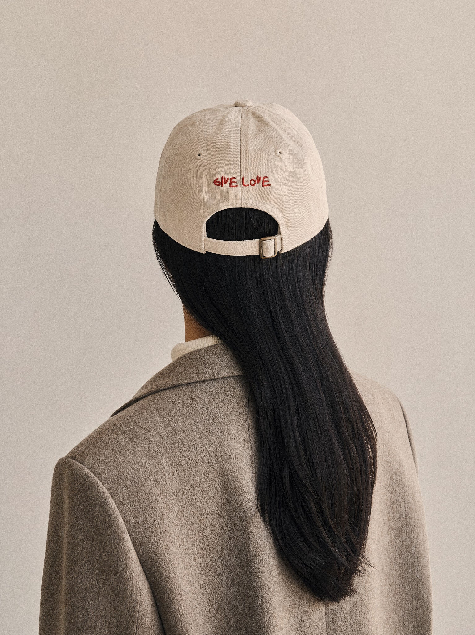 cap charity heart arrow oyster back give love asian woman