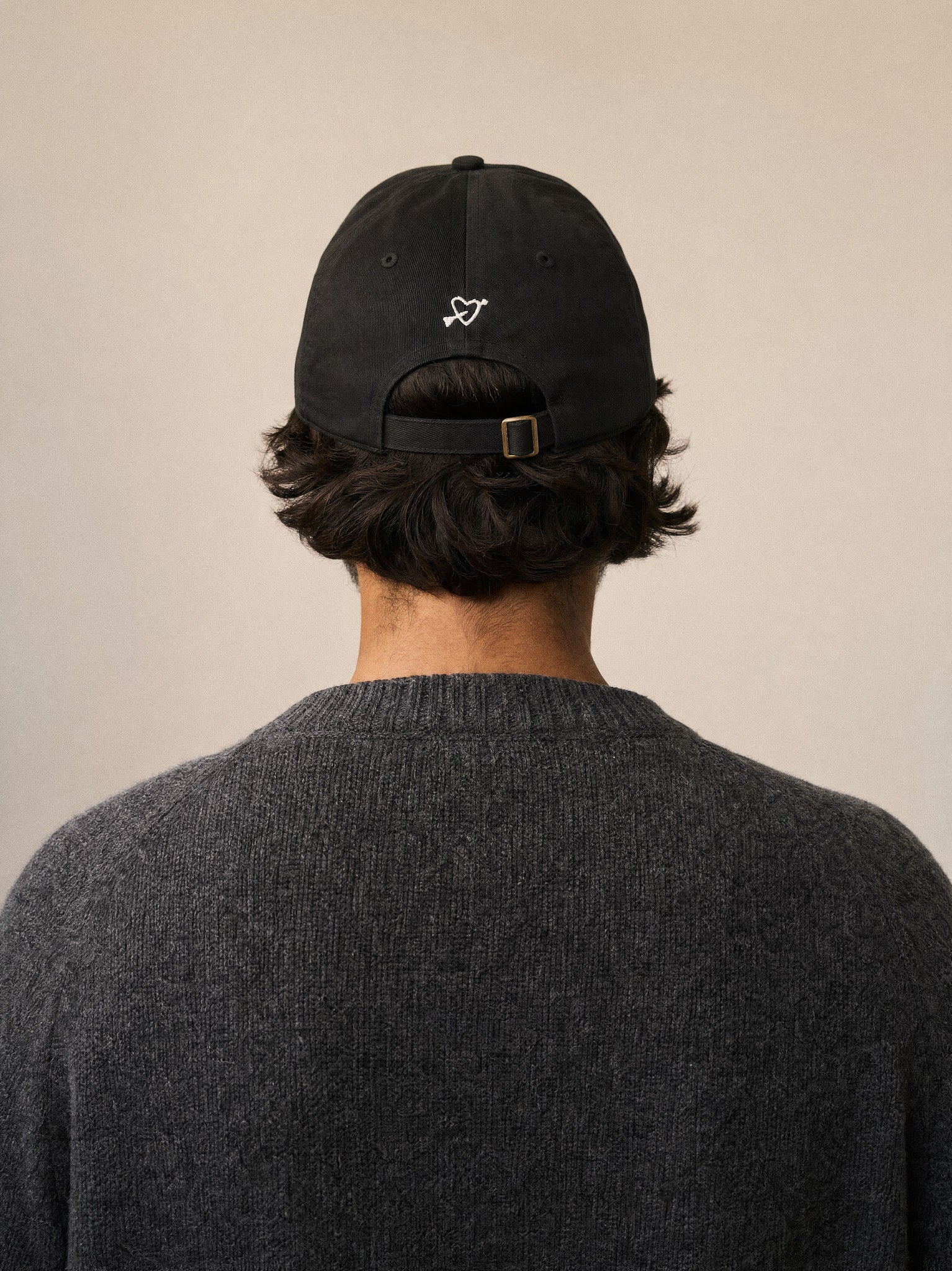 cap more dog is more dog black back view mediterranean man