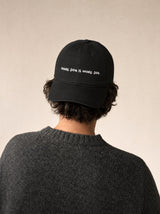 cap more dog is more dog black front view mediterranean man