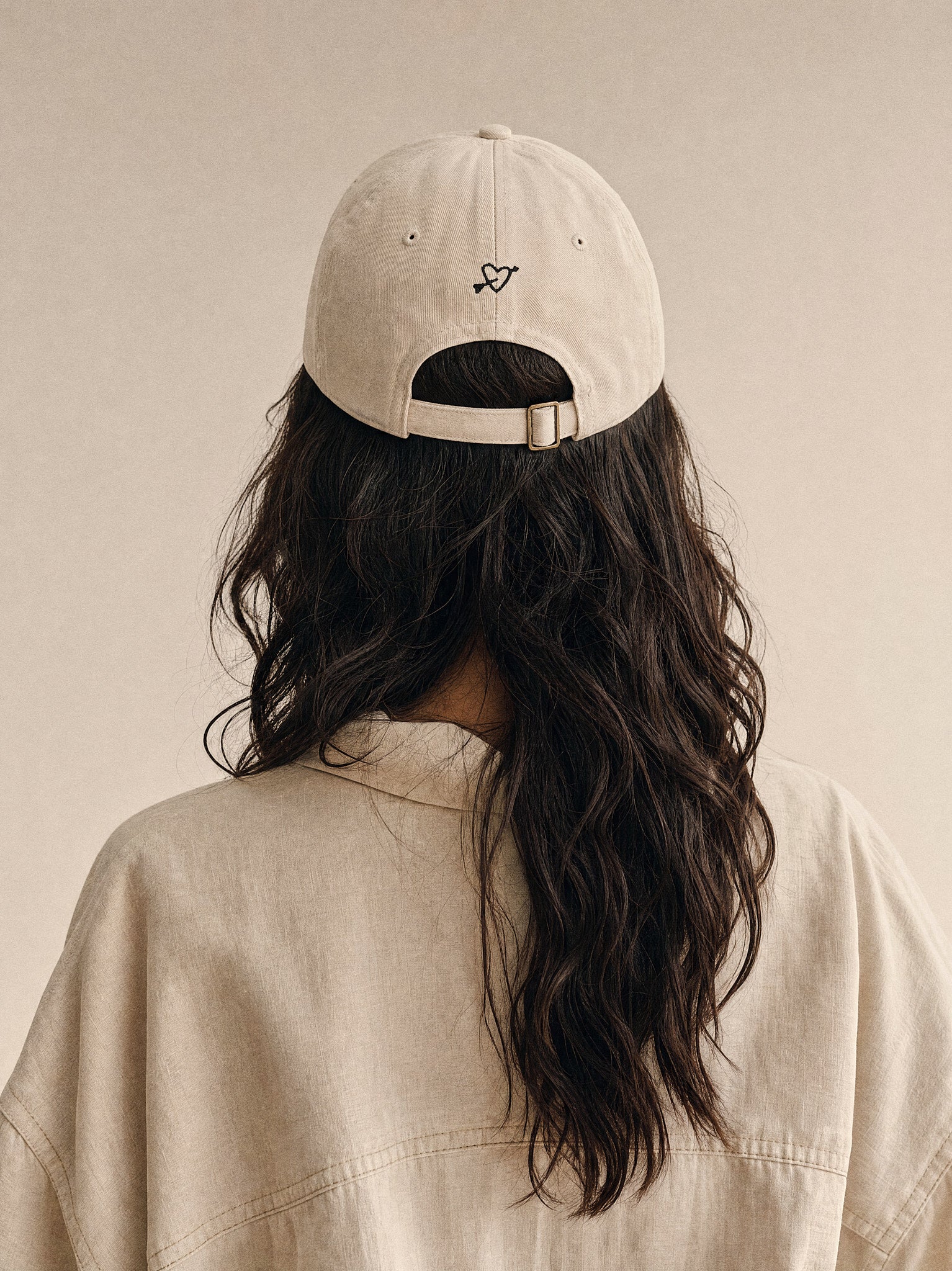 cap more dog is more dog oyster back view latina woman