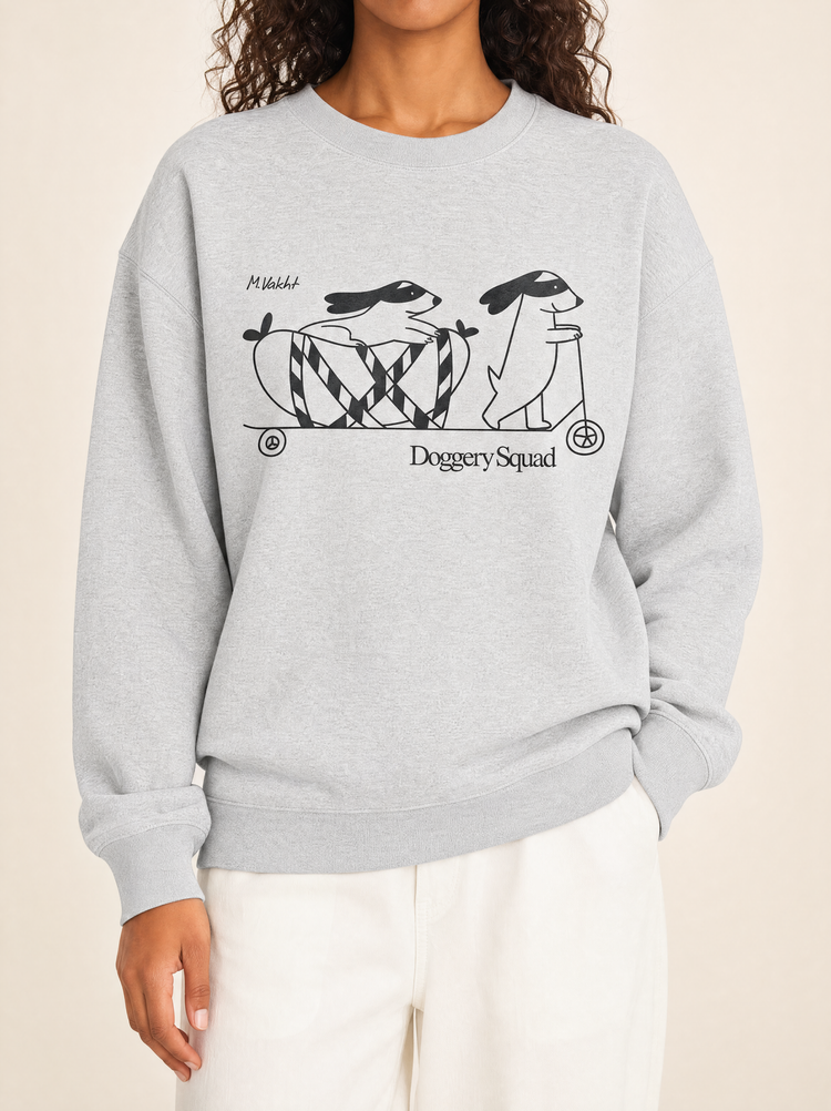 doggery squad skateboard dogs design heather grey crewneck sweatshirt female model product shot