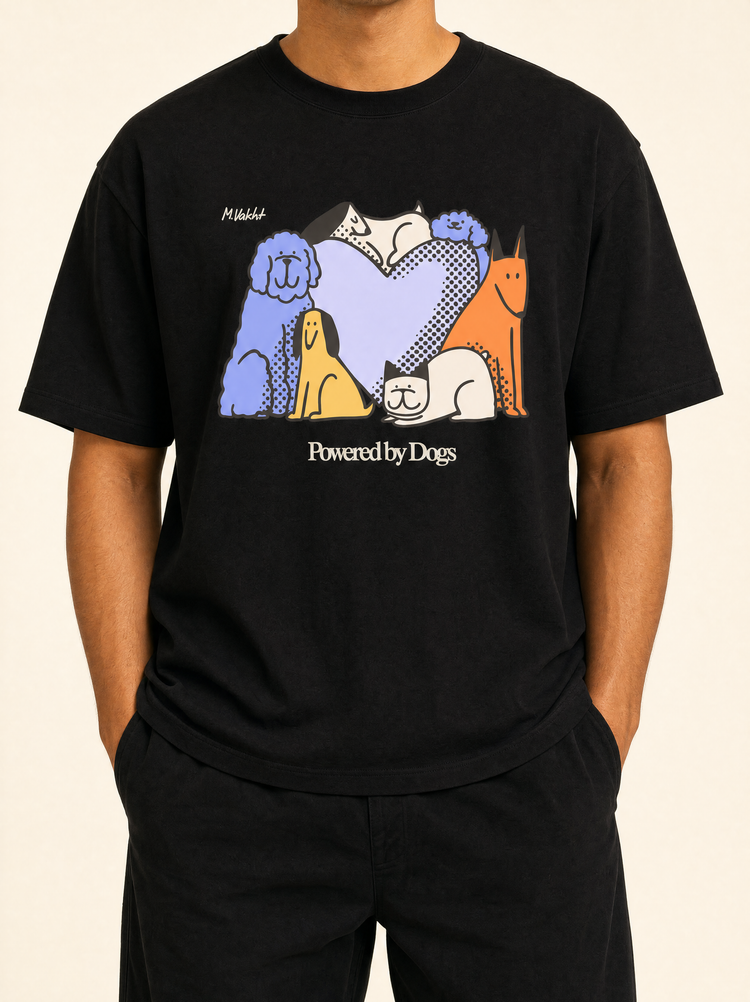 powered by dogs full color design black t shirt male model product shot