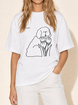 artist collection bloom tulip dog design pure white t shirt female model editorial close up