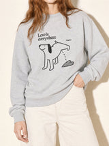 artist collection love is everywhere dog heart design heather grey crewneck sweatshirt female model editorial