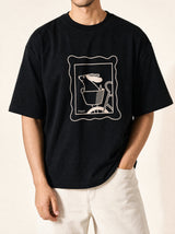 artist collection sunday ride basket dog design black t shirt male model editorial mid figure