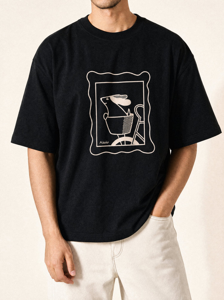 artist collection sunday ride basket dog design black t shirt male model editorial mid figure